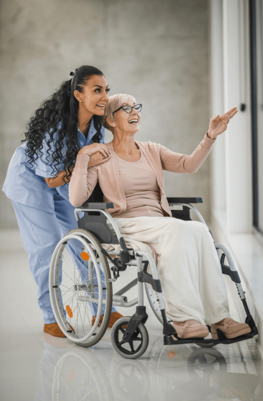 Nurse assisting patient in wheelchair